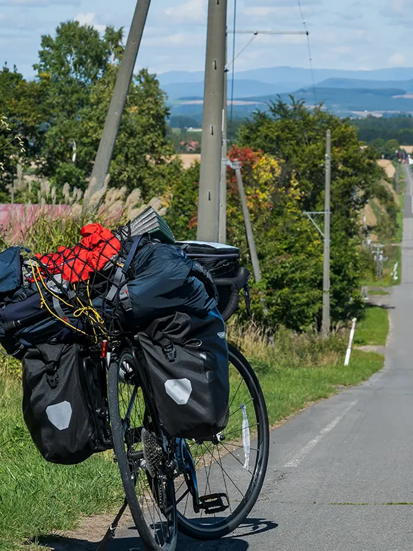 Touring bike fully loaded with panniers ready for a multi-day Hokkaido journey